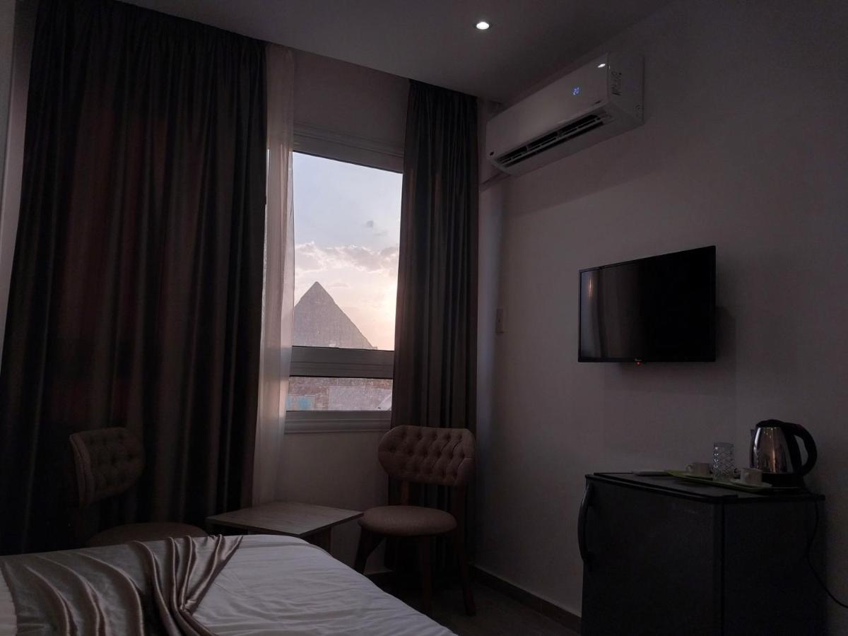 Eagles Pyramids View Hotel Kafret el-Gabal Exterior foto